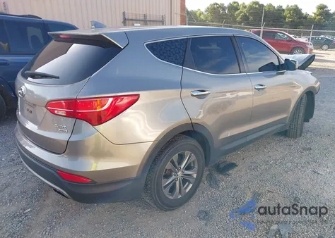 2014 Hyundai Santa Fe Sport z USA, uszkodzony, nr VIN 5XYZTDLB3EG133890